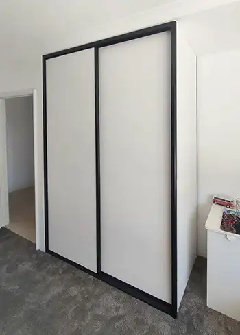 White Vinyl Sliding Wardrobe Doors with Black Frame